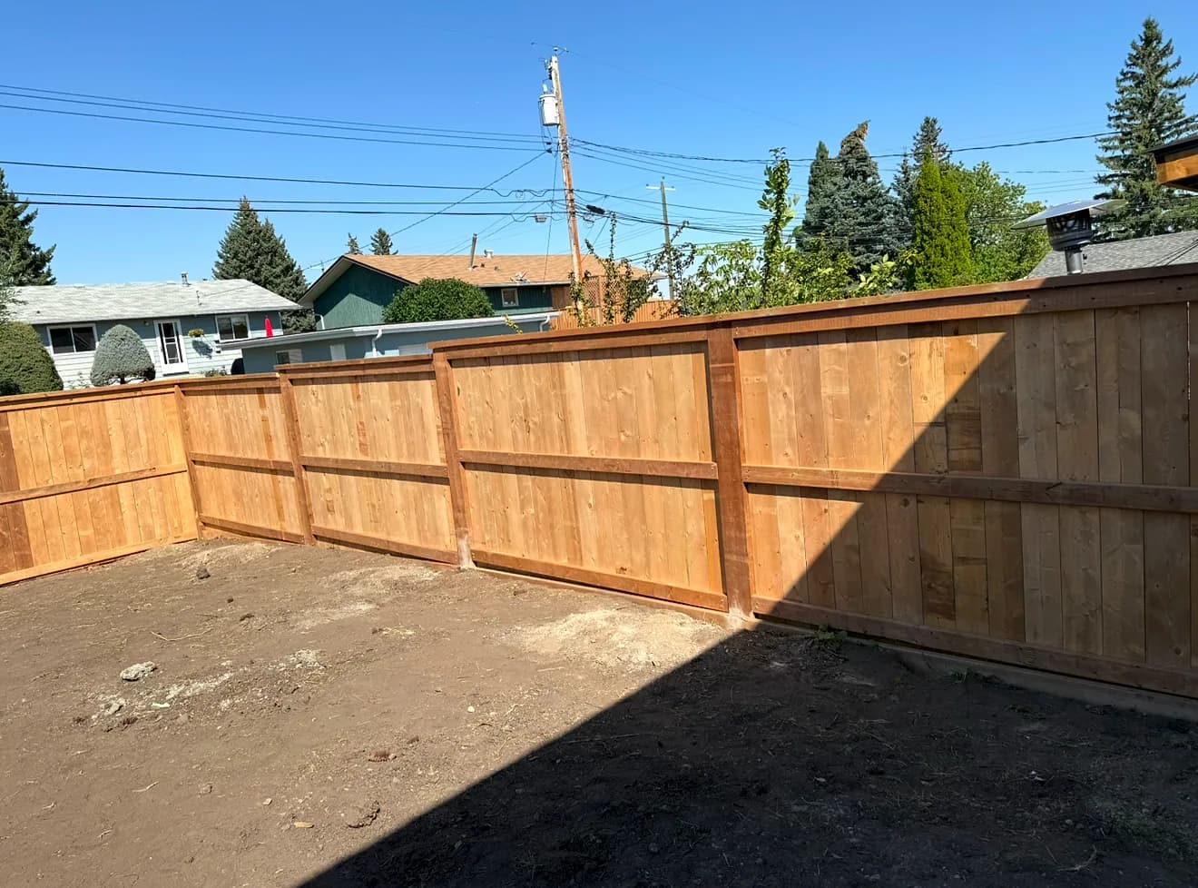 Wood Fences install by A Class Fencing in Calgary
